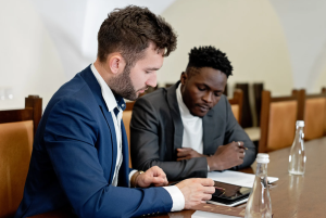 IT consultant meeting with a business professional to review technology needs